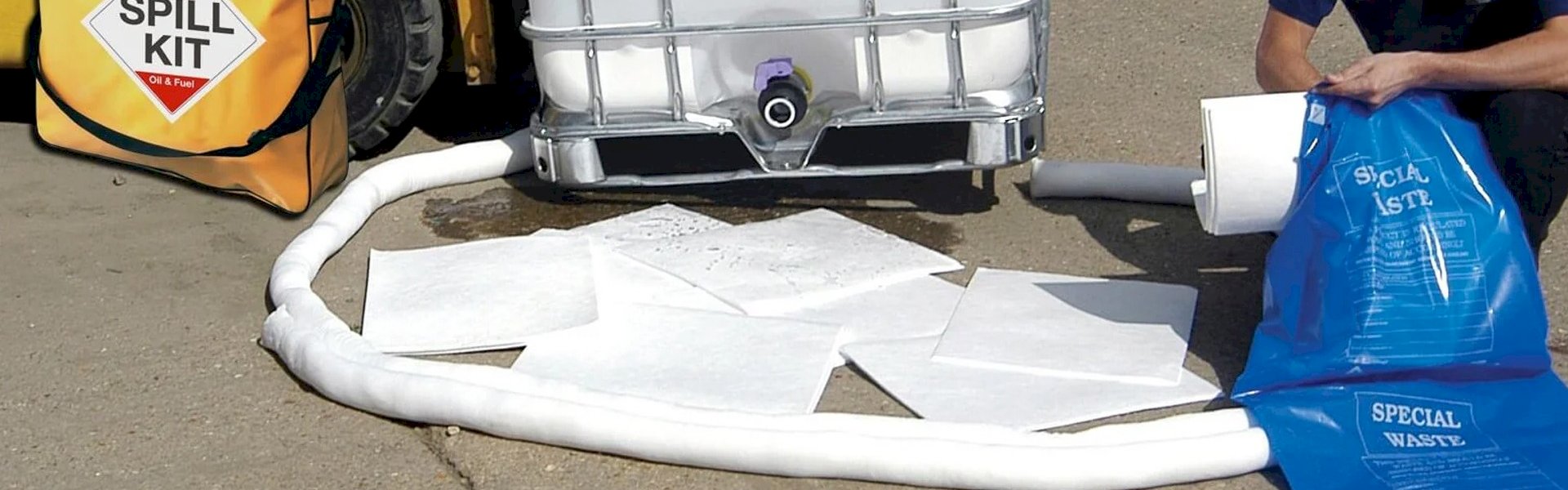 Garage oil spill response kit used for cleaning leaks and protecting workshop floors